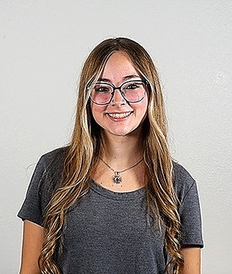 Title Clerk Olivia Bitz in Office at Eide Ford Mandan